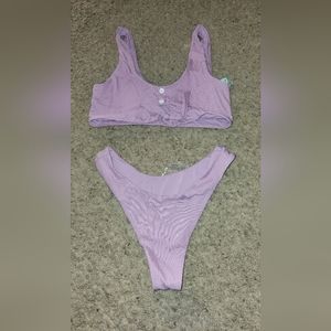 Purple swim suit from Fashion Nova